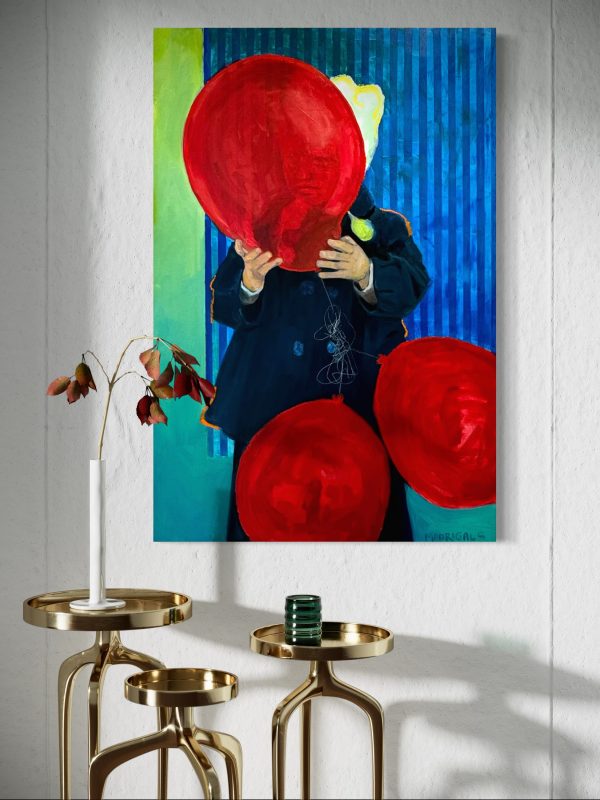 Painting of a girl in a navy jacket holding a red balloon up to her face. Two other balloons hang down beside her. The painting is on a wall; in front of the painting are 3 small nesting tables.